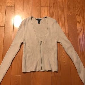 Long Sleeve Zip Low Cut Top.